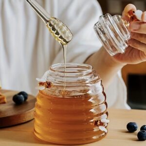 ظرف عسل شیشه‌ای از جنس بوروسیلیکات مقاوم به همراه همزن