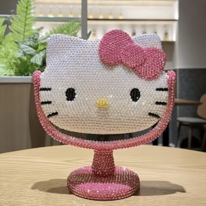 آینه رومیزی چرخشی هلو کیتی تزئین‌شده با نگین‌های براق