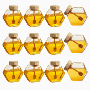 بسته ۱۲ عددی شیشه عسل  با در بامبو و قاشق چوبی طراحی شش‌ضلعی شفاف، مناسب برای نگهداری عسل